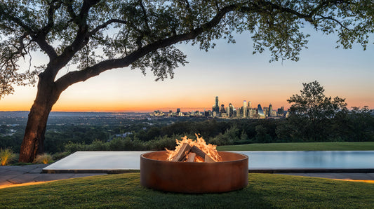 scenery shot of circular fire pit outside with a city skyline in the background