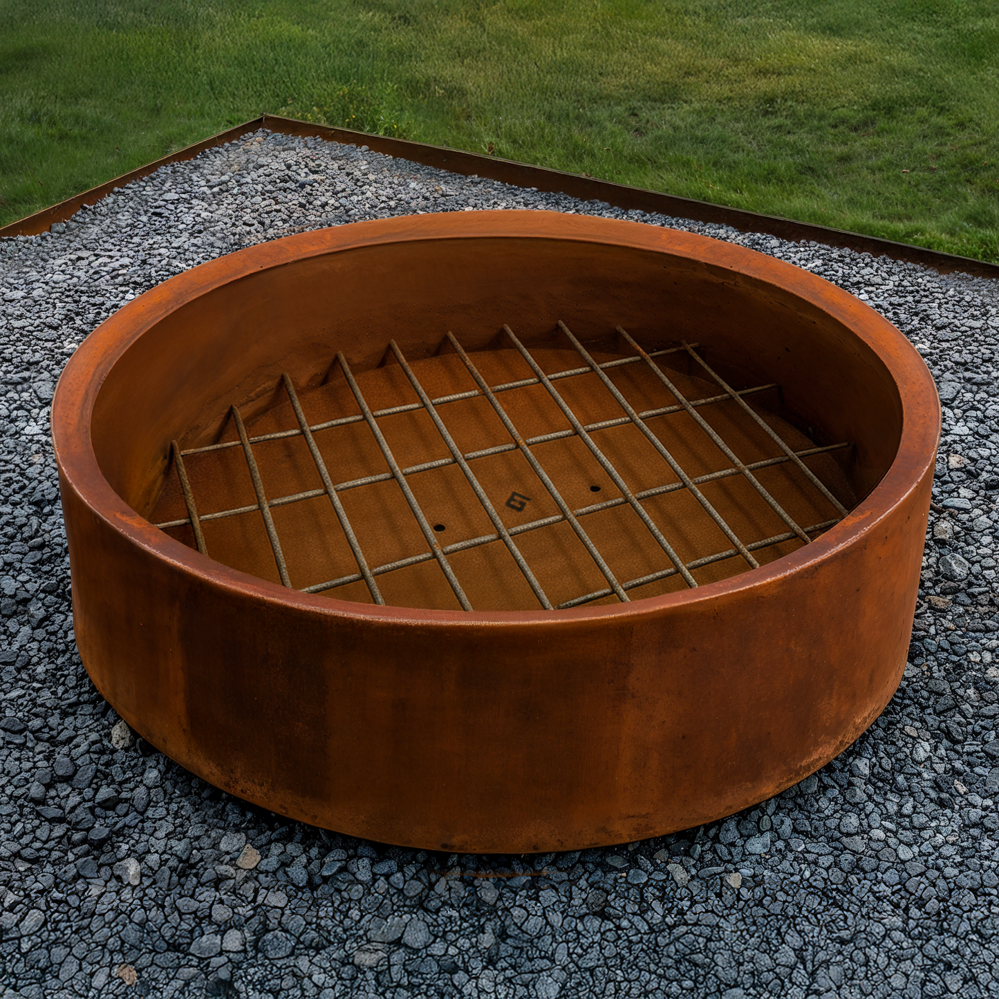 The Jake fire pit with metal grate inside