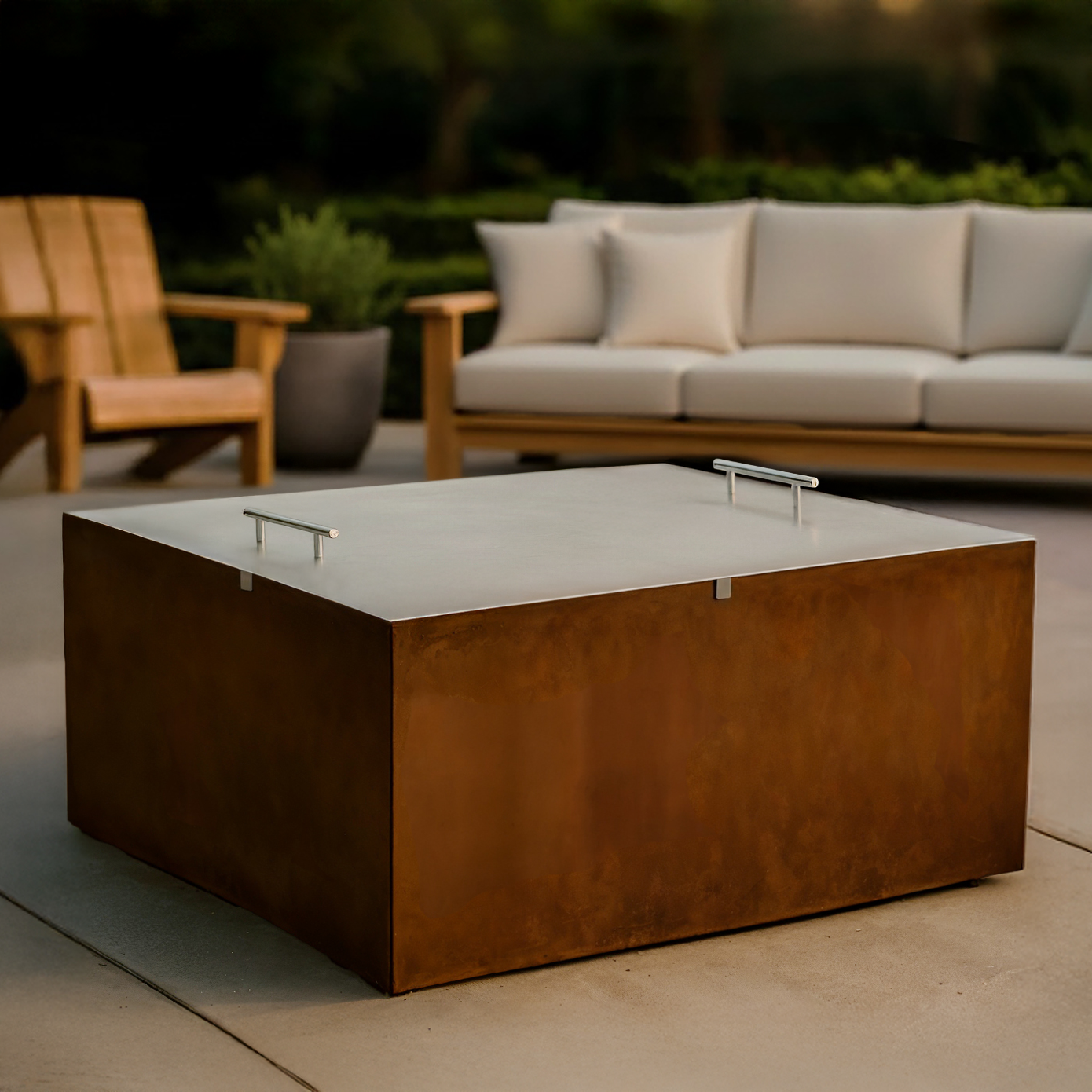 Jackson fire pit with lid on a patio with outdoor furniture in the background