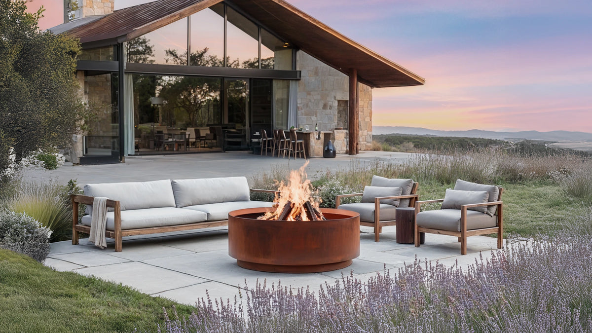 Outdoor patio with Jake fire pit, chairs, and a scenic view